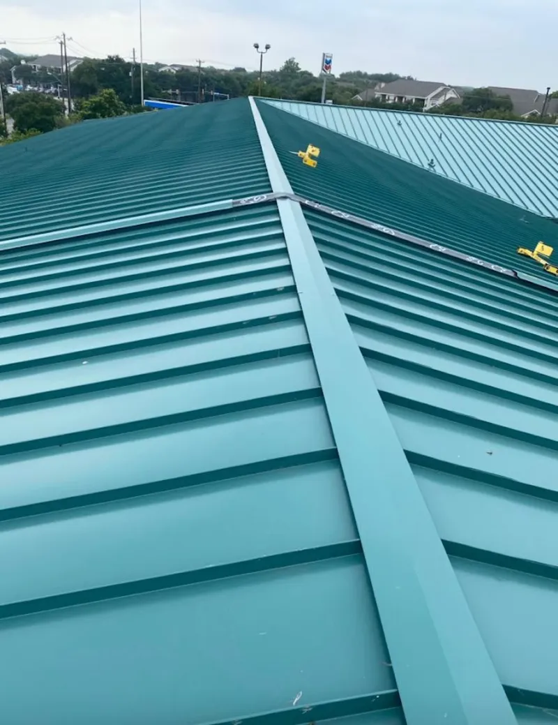Green commercial metal roof ridge and valley for Metal Roof Repair in Oviedo